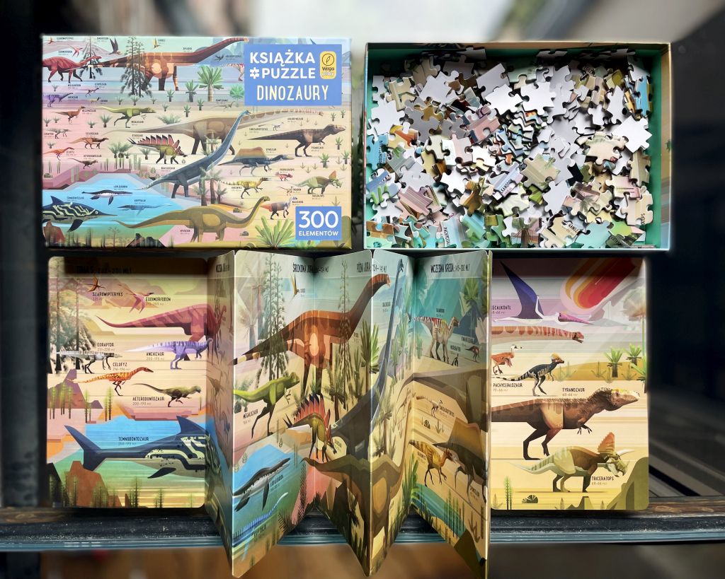Puzzle 300 elementów. Dinozaury + książka